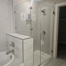 BEFORE AND AFTER INSATLL OF A NEW FRAMELESS SHOWER