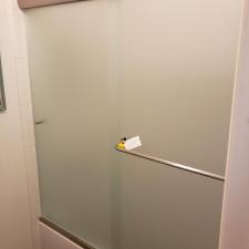 Frameless shower doors with privacy glass
