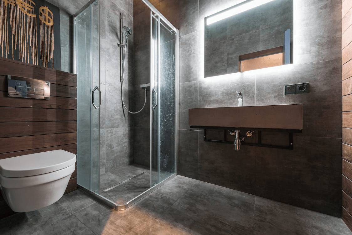 Modern bathroom interior with corner shower