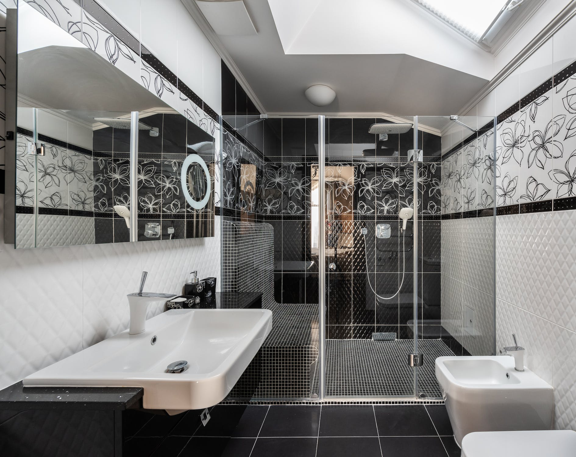 An image of a bathroom with a glass shower