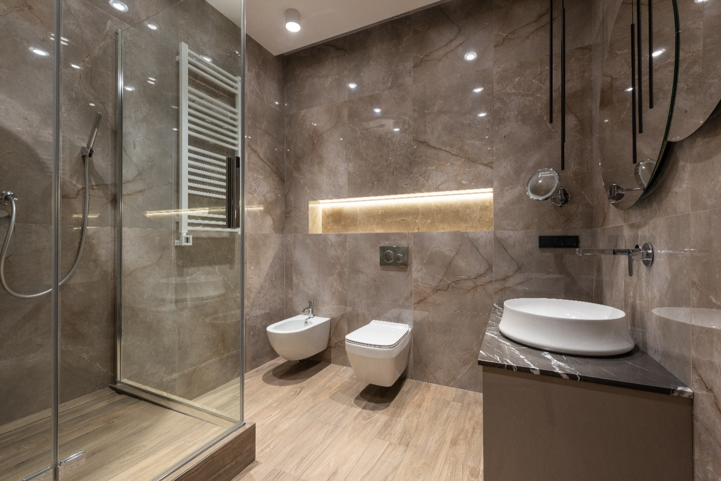 a spacious modern bathroom with a sleek and clean shower glass