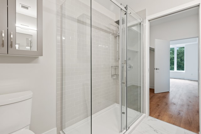 Shower glass enclosure in bathroom