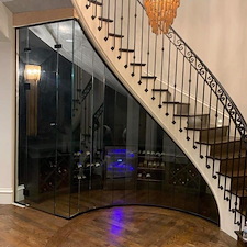Custom Curved Glass Wine Room Under Staircase in Dallas, TX 0